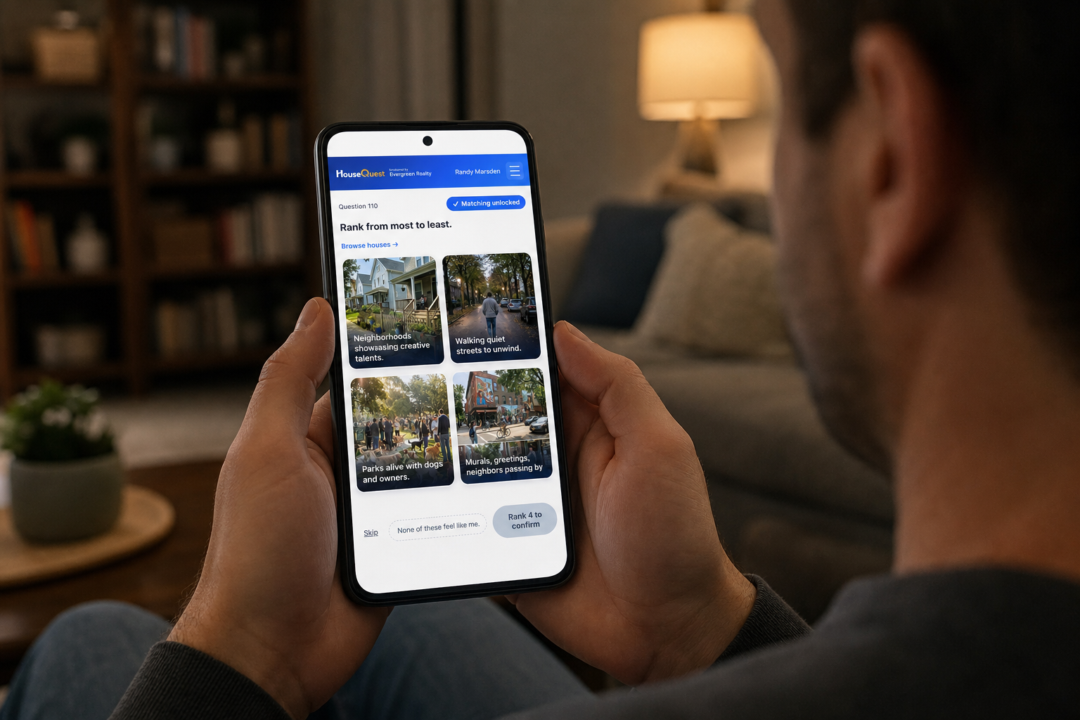 Over the shoulder view of someone ranking house preference cards on their phone in HiQ